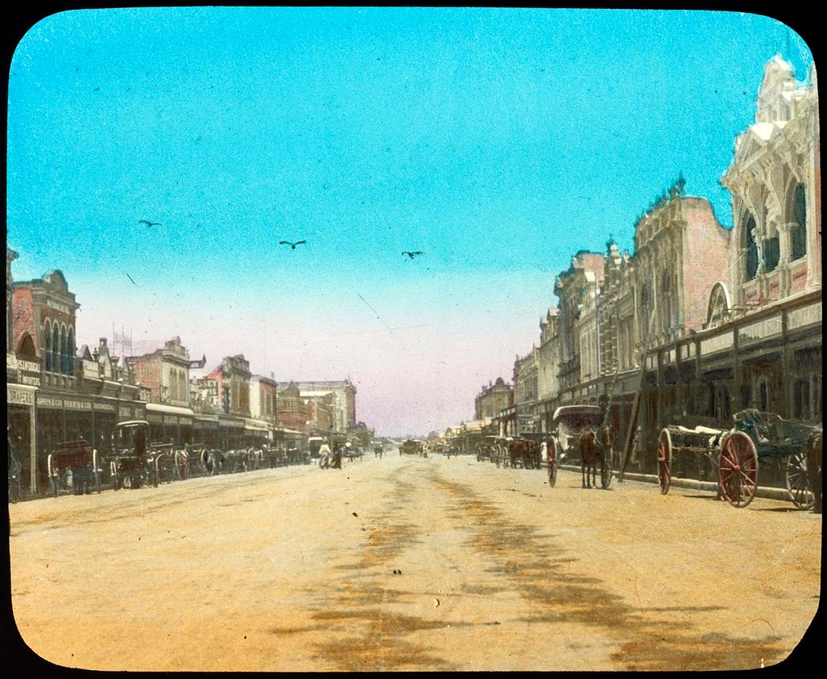 Rockhampton. Horses and buggies outside businesses, circa 1910