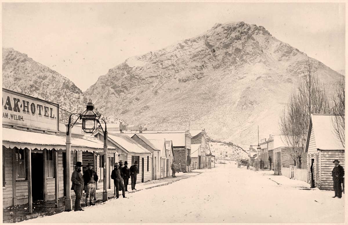 Arrowtown. Panorama of street, winter, 1880s