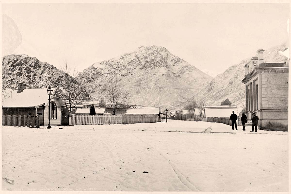 Arrowtown. Panorama of street, winter, 1880s