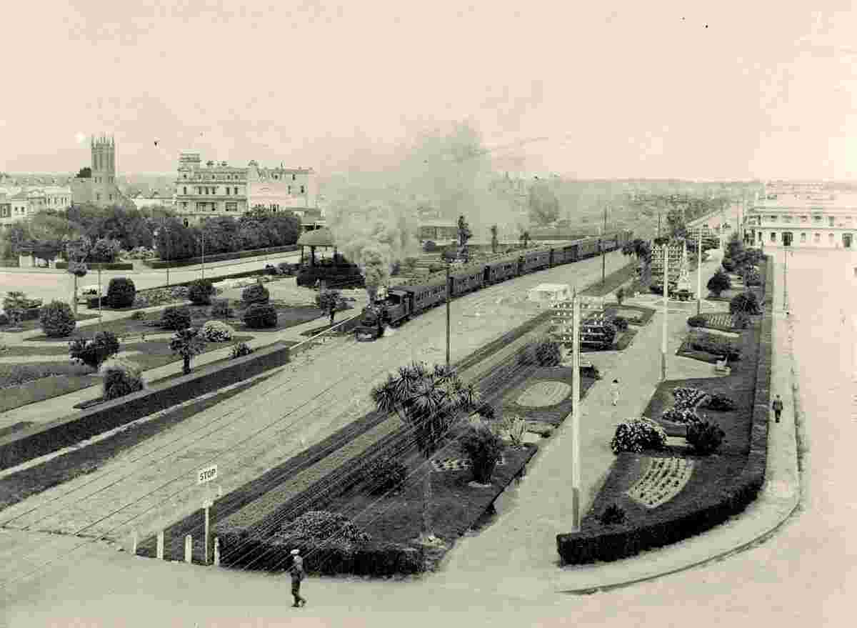 Palmerston North. Panorama of the City and railway with train
