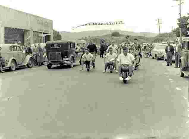 Paraparaumu. Wheelbarrow racing down, 1955