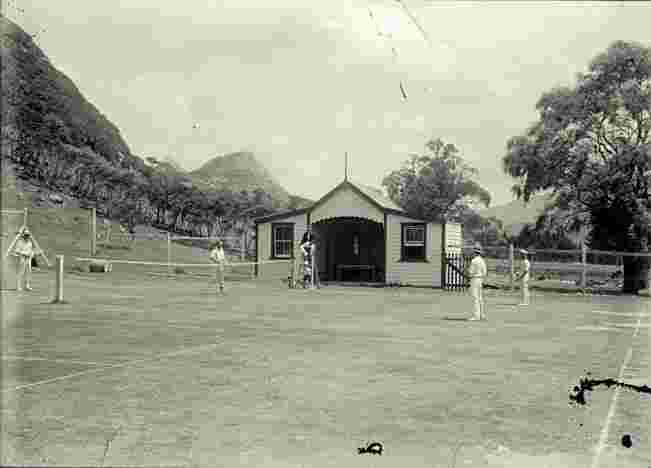 Te Araroa. Men playing tennis, circa 1920