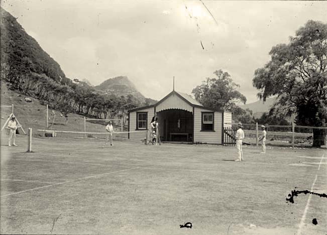 Te Araroa. Men playing tennis, circa 1920
