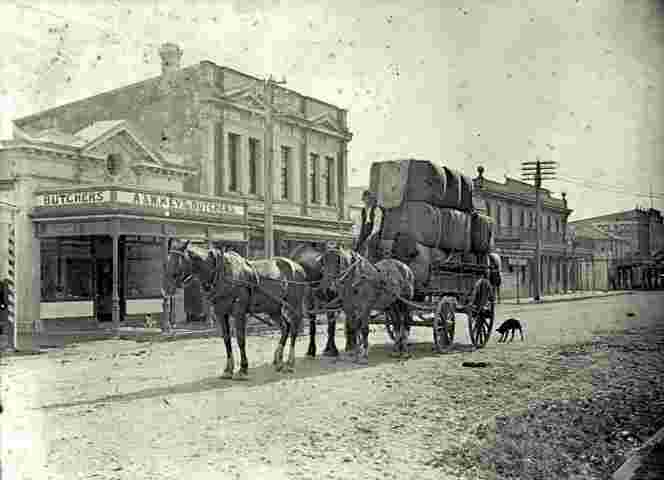 Upper Hutt. Man on a horse pulled cart, 1920